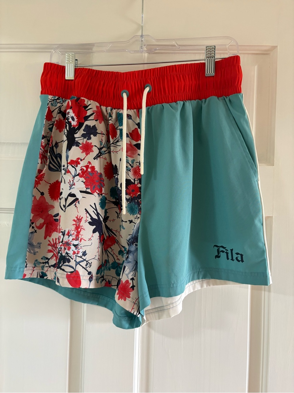 Fila Women's Teal Floral Athletic Shorts with Red Waistband